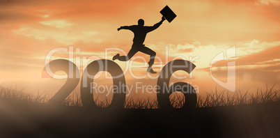 Composite image of businessman jumping with briefcase