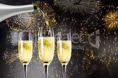 Composite image of champagne pouring