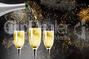 Composite image of champagne pouring