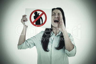 Composite image of shouting brunette holding page