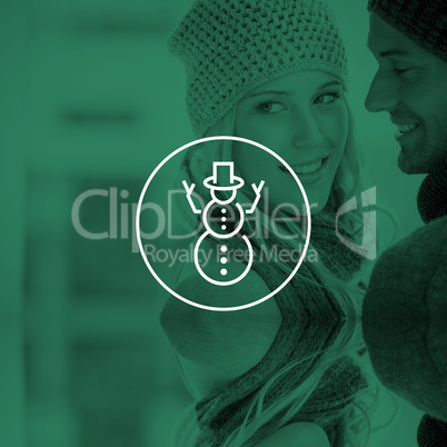 Composite image of couple in warm clothing hugging