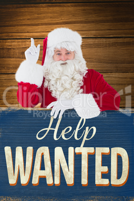 Composite image of smiling santa claus doing a gesture