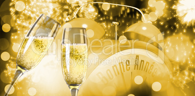 Composite image of champagne glasses clinking