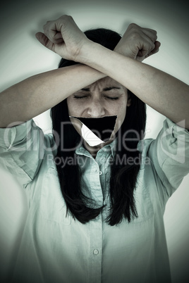 Composite image of troubled woman crying