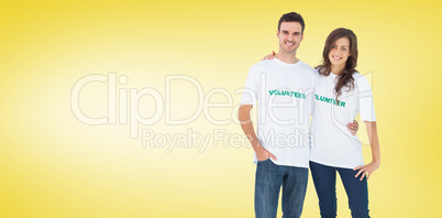 Composite image of two cheerful people wearing volunteer tshirt