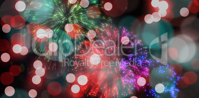 Colourful fireworks exploding on black background