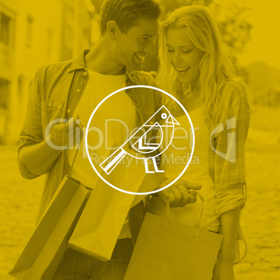 Composite image of hip young couple looking at their shopping bags