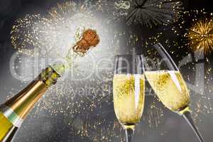 Composite image of champagne popping