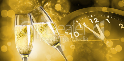 Composite image of champagne glasses clinking