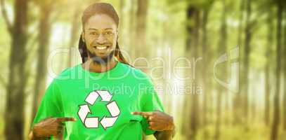 Composite image of happy environmental activist in the park