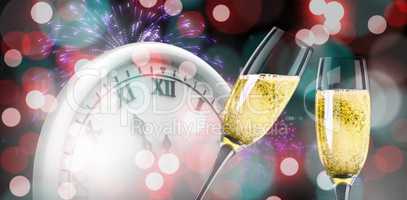 Composite image of champagne glasses clinking