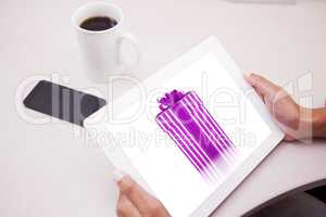 Composite image of woman using tablet pc
