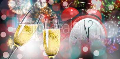 Composite image of champagne glasses clinking