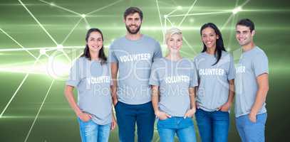 Composite image of volunteers friends smiling at the camera