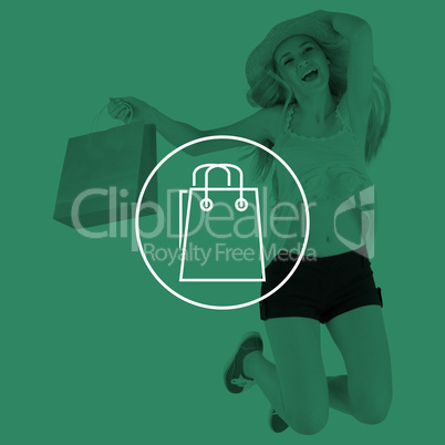 Composite image of pretty young blonde holding shopping bags