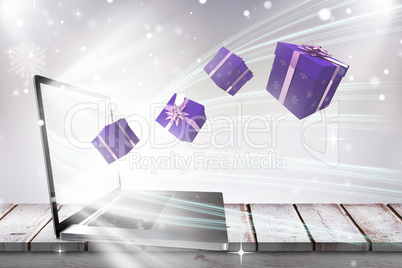 Composite image of purple presents