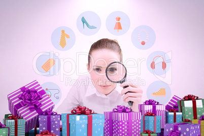 Composite image of businesswoman typing and looking through magn