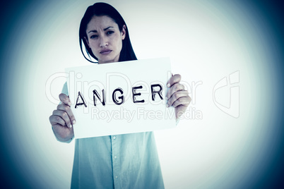 Composite image of sad woman showing sign