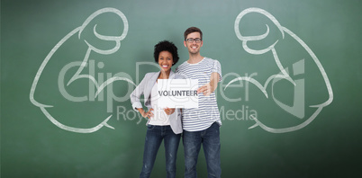 Composite image of portrait of a happy couple holding a voluntee