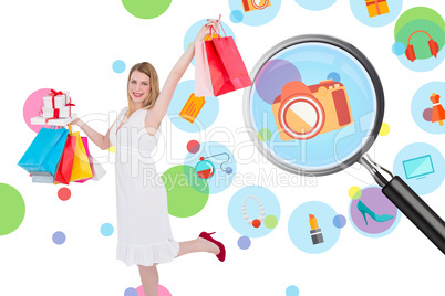 Composite image of elegant blonde with shopping bags and gifts