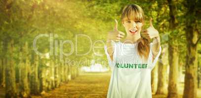 Composite image of natural blonde wearing a volunteering t shirt