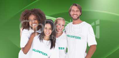 Composite image of smiling group of volunteers