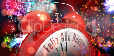 Composite image of feliz ano nuevo in red alarm clock