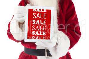 Composite image of santa claus showing tablet pc