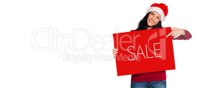 Composite image of woman holding a white sign