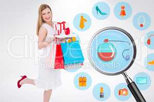 Composite image of pretty blonde with presents
