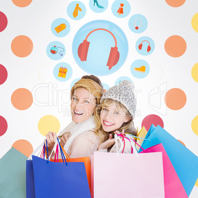 Composite image of beautiful women holding shopping bags looking