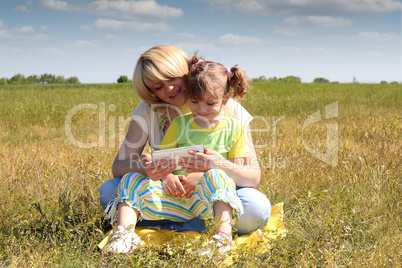 mother and daughter with tablet