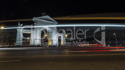 monumental gate at night