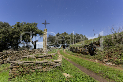 ancient cross in the field