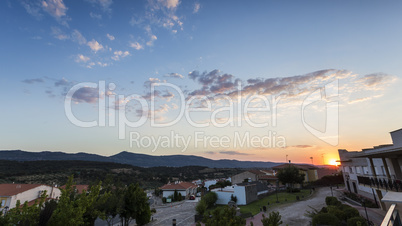 sunset in a village