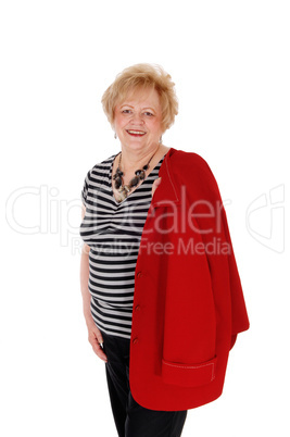 Smiling older woman standing.