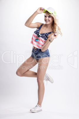 Blonde woman posing in American flag shirt