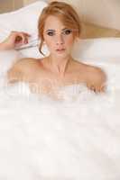 Woman in bath relaxing. Closeup of young woman in bathtub bathin