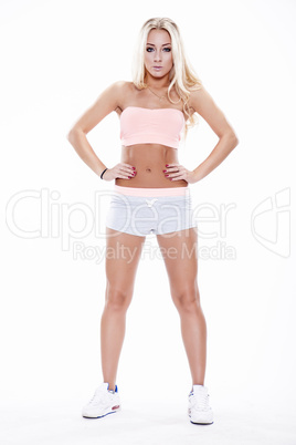 portrait of a young cheerful woman standing on white background