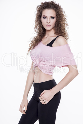 portrait of a young cheerful woman standing on white background