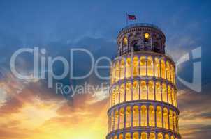Tower of Pisa in Miracles Square, Illuminated at Night with sunset, Italy