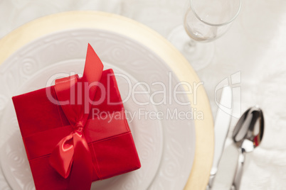 Christmas Gift with Place Setting at Table