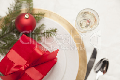 Christmas Gift with Place Setting at Table