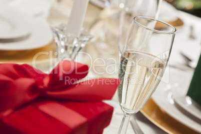 Christmas Gift with Place Setting at Table