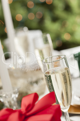 Christmas Gift with Place Setting at Table