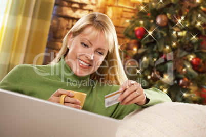 Woman with Credit Card In Front of Laptop, Christmas Tree