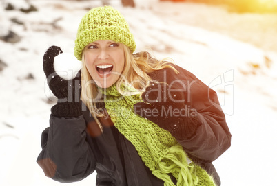 Attractive Woman Having Fun in the Snow