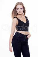 Young slim sexy woman in black dress isolated on white backgroun