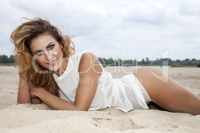 beautiful brunette woman on the beach