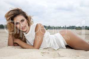 beautiful brunette woman on the beach